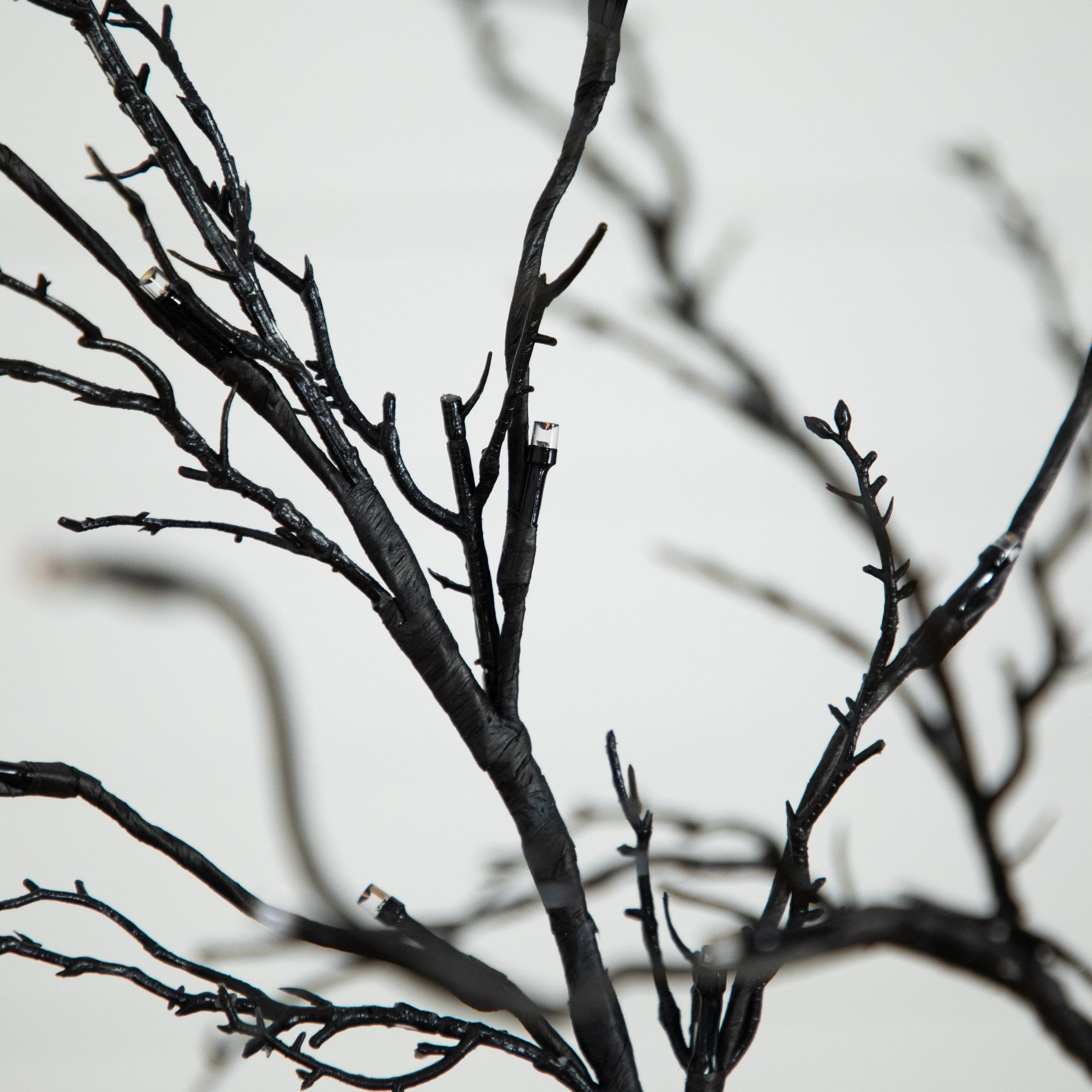 5’ Pre-Lit Halloween Deluxe Black Twig Artificial Tree with 102 Orange & Purple LED Lights - Image 8
