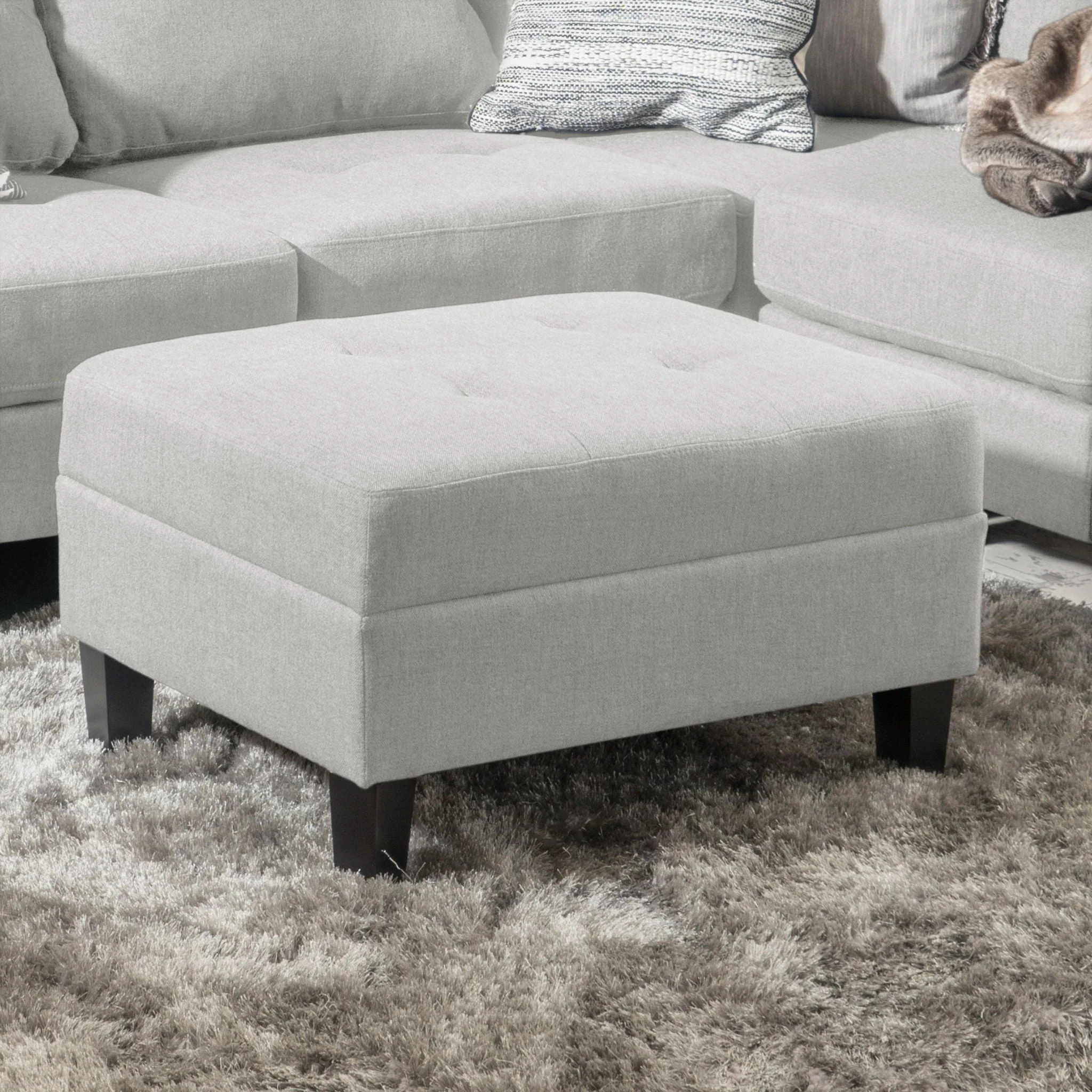 Classic Ottoman With Birch Wood Legs And Fabric Upholstery - Image 4