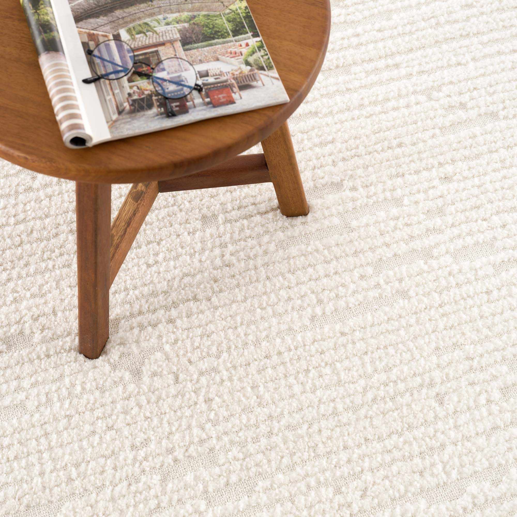 Kulu Textured Area Rug with Tassels - Image 11