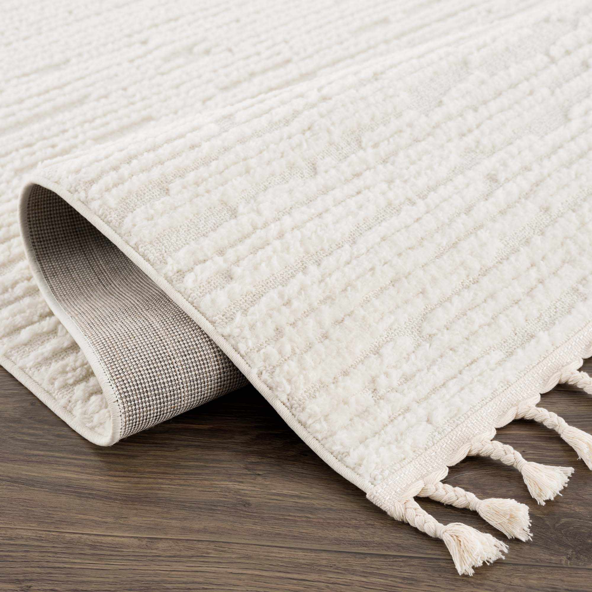 Kulu Textured Area Rug with Tassels - Image 7