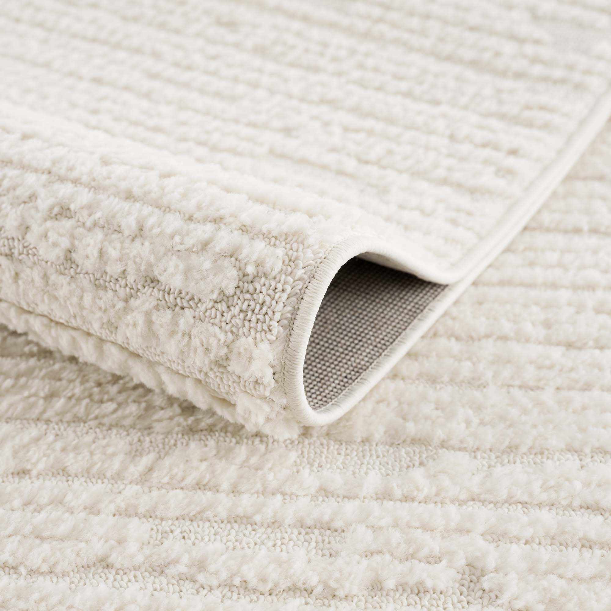 Kulu Textured Area Rug with Tassels - Image 8