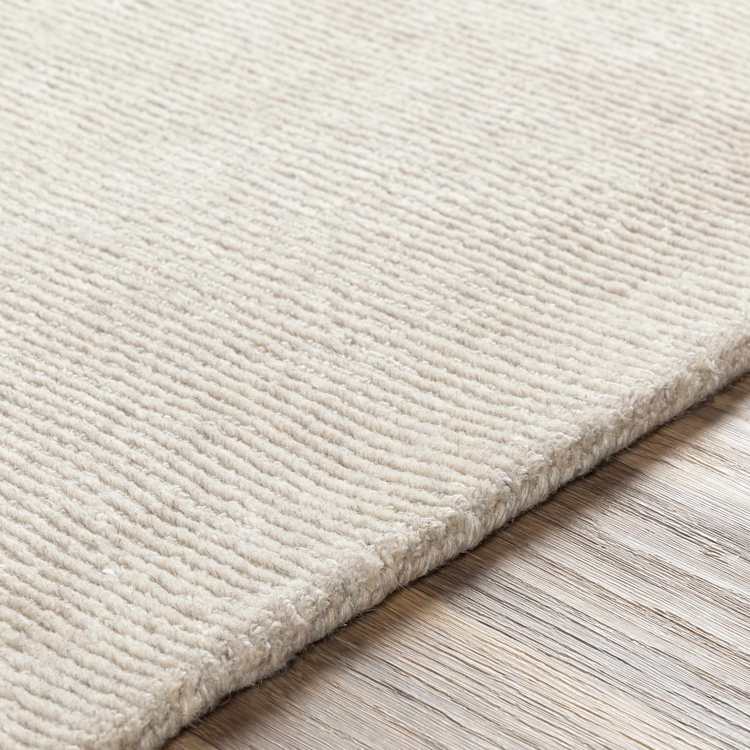 Mariba Ivory Wool Area Rug - Image 8