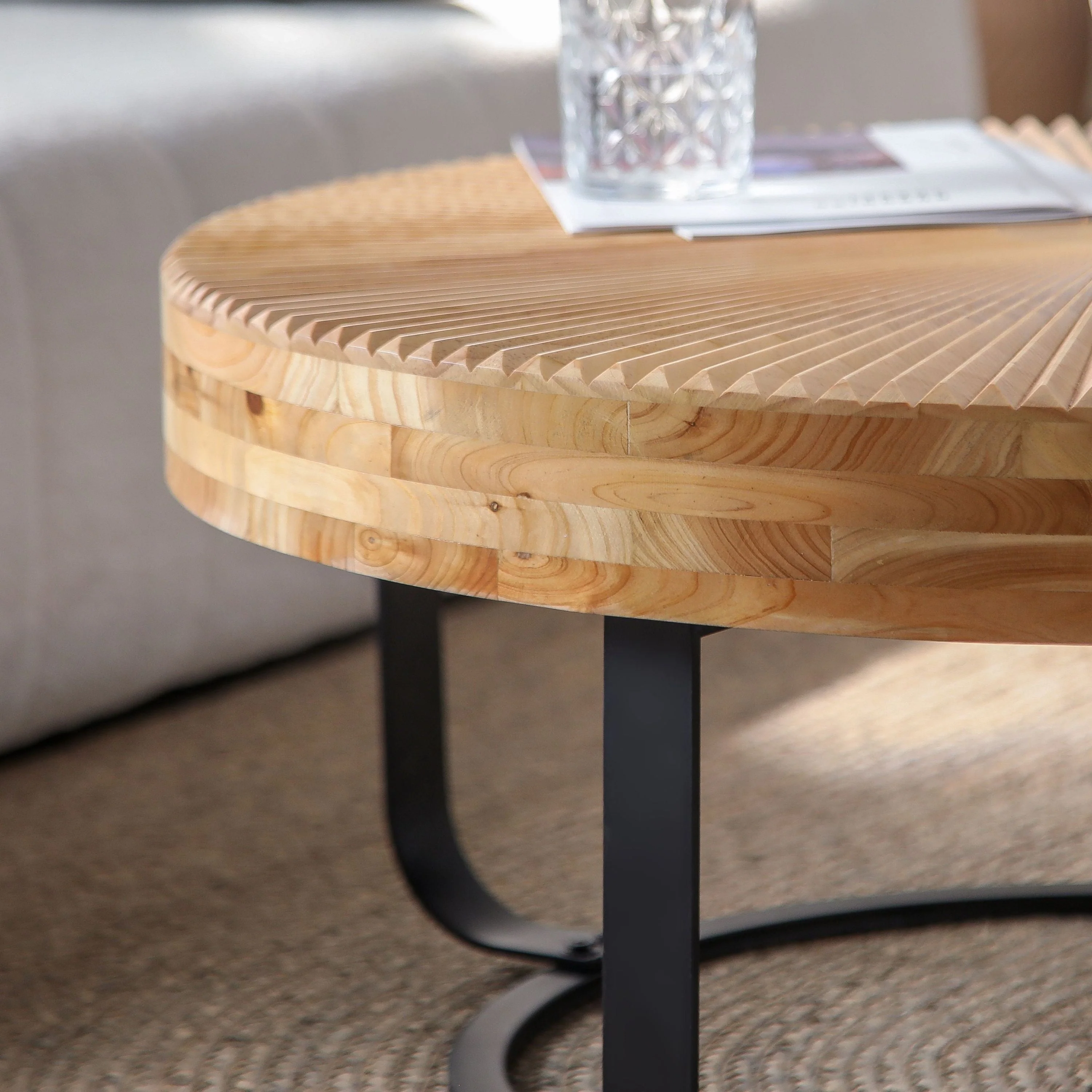 Modern Round Coffee Table with Wooden Carving Pattern and Metal Legs - Image 11