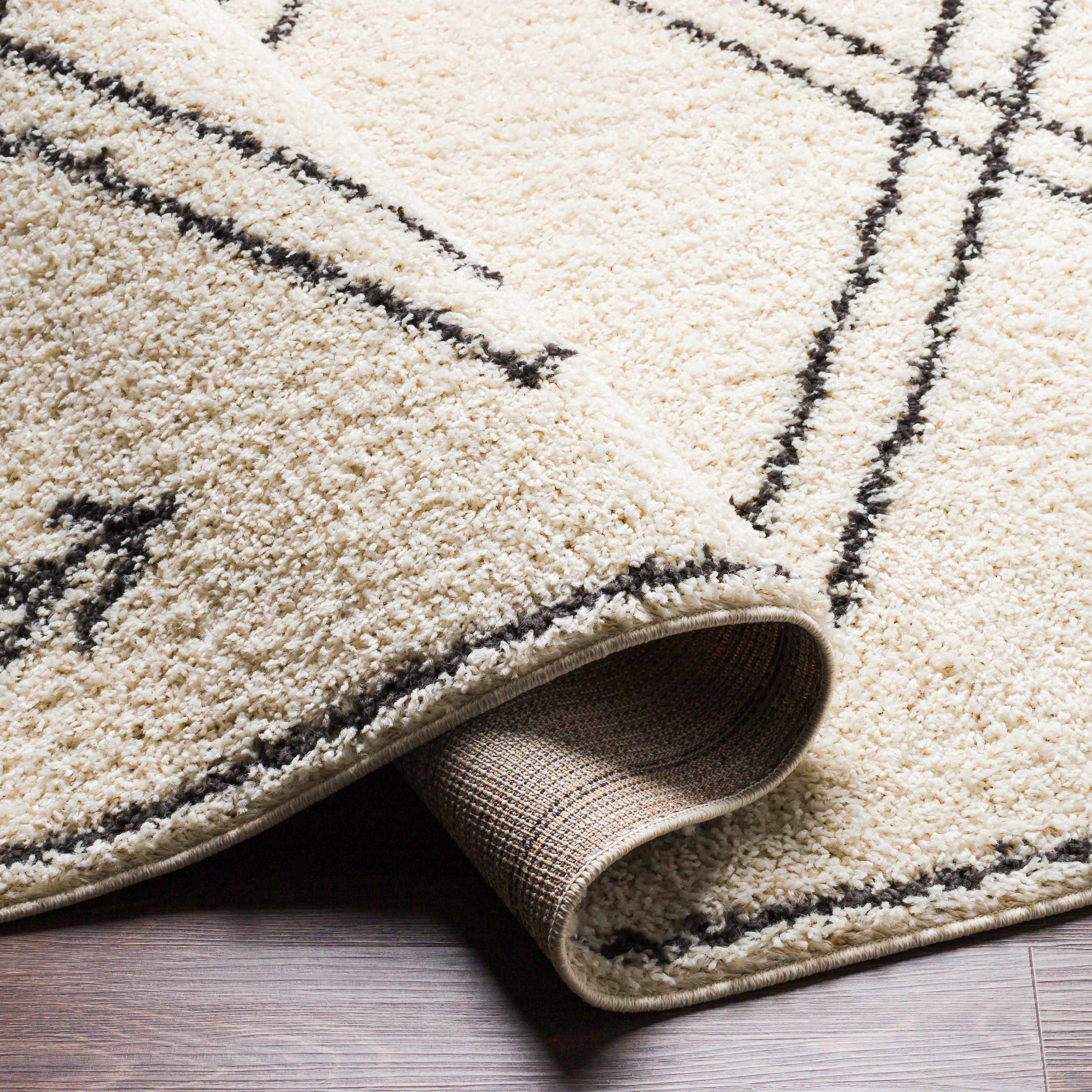 Nancalobasaan Area Rug - Clearance - Image 6