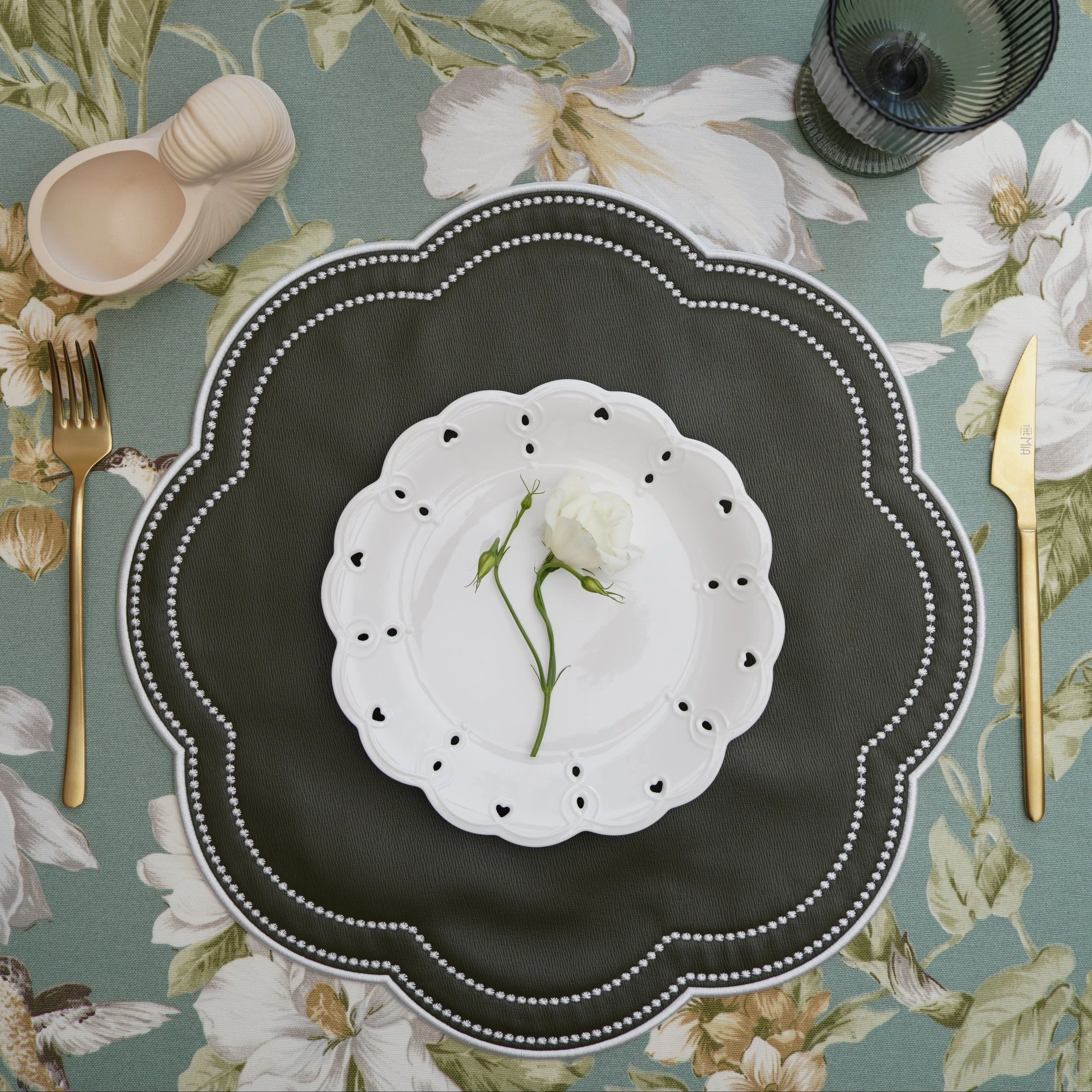 NURTURE GREEN SCALLOPED FAUX LEATHER PLACEMAT
